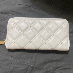 White and gold wallet